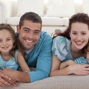 Family On Floor In Living-room